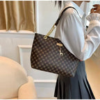 Sandglass Women's casual shoulder tote bag in dark brown, featuring a spacious design and comfortable shoulder straps.