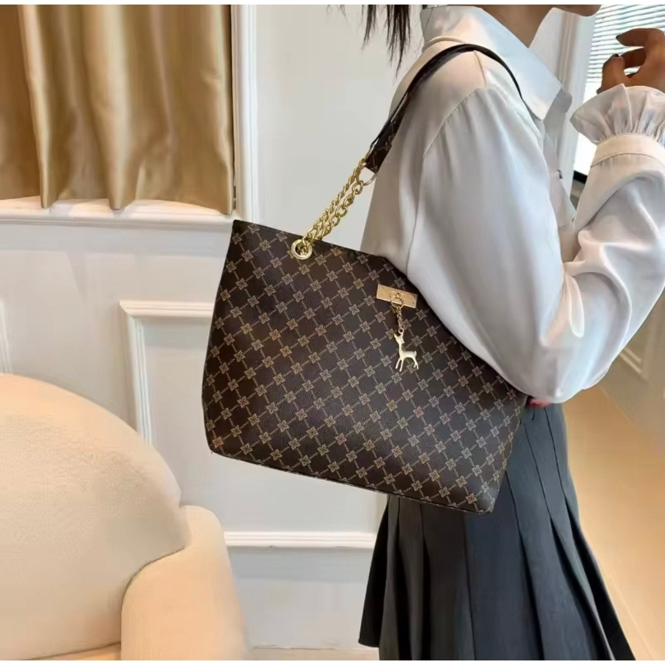 Sandglass Women's casual shoulder tote bag in dark brown, featuring a spacious design and comfortable shoulder straps.