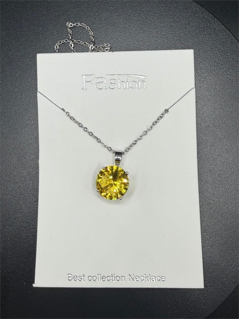 Republic Mercantile 2ct Citrine style fashion crystal necklace featuring a vibrant yellow gemstone pendant on a delicate chain.