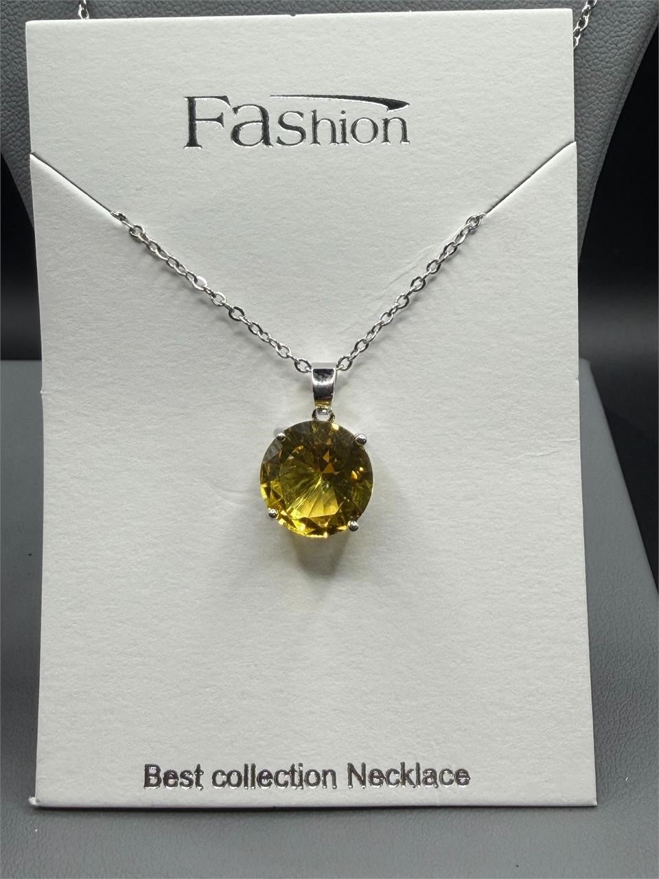 Two-carat citrine fashion crystal necklace with gold-tone chain, stylish jewelry piece by Republic Mercantile.