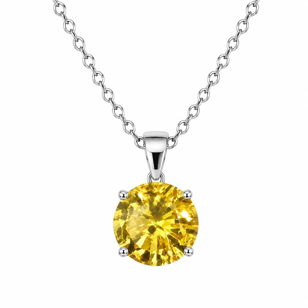 Republic Mercantile 2ct Citrine style fashion crystal necklace featuring a vibrant orange-yellow gemstone pendant against a neutral background.