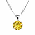 Republic Mercantile 2ct Citrine style fashion crystal necklace featuring a vibrant orange-yellow gemstone pendant against a neutral background.