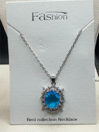Elegant 2ct aquamarine style crystal pendant necklace with silver chain from Republic Mercantile, featuring a sparkling blue gemstone design.
