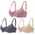 Three women's push-up bras in size 36C, featuring supportive cups and adjustable straps, in a neutral color.