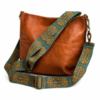 Brown vegan leather hobo crossbody bag with adjustable strap and spacious interior, stylishly designed by Republic Mercantile.