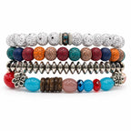 Handcrafted 4 strand boho beaded charm bracelet with colorful beads and metal charms, from Republic Mercantile.
