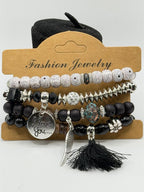 Handcrafted 4 Strand BOHO beaded charm bracelet with colorful beads and metal accents, by Republic Mercantile.