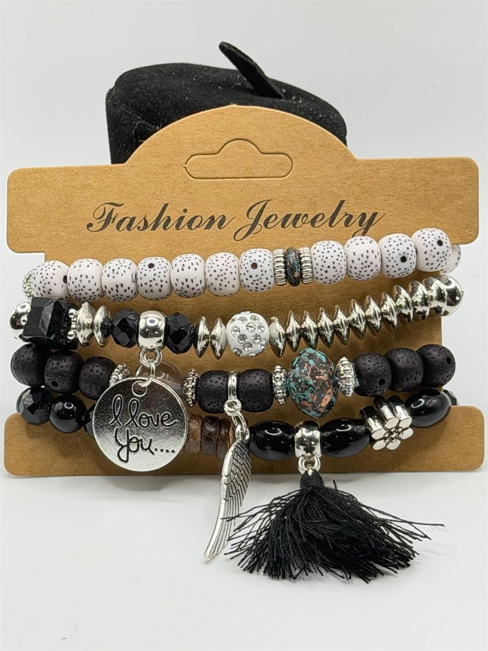 Handcrafted 4 Strand BOHO beaded charm bracelet with colorful beads and metal accents, by Republic Mercantile.