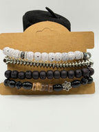Handcrafted 4 strand boho beaded charm bracelet with colorful beads and metal charms, from Republic Mercantile.