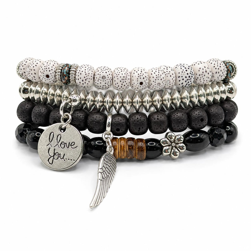 Handcrafted 4 strand boho beaded charm bracelet with colorful beads and metal charms, created by Republic Mercantile.