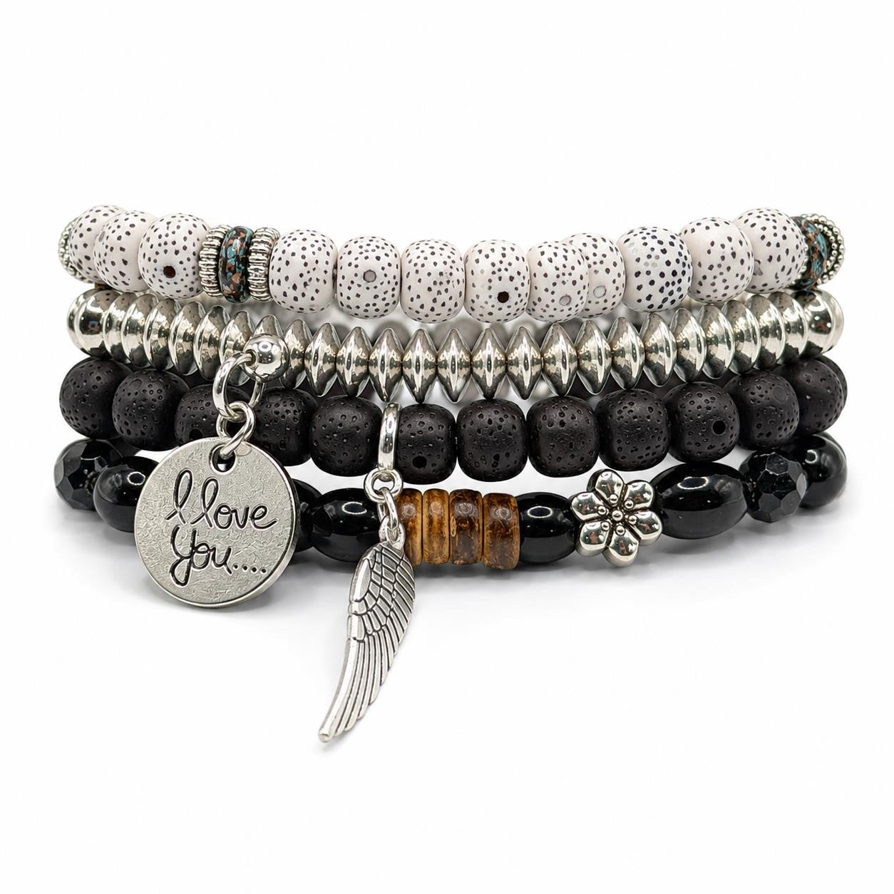Handcrafted 4 strand boho beaded charm bracelet with colorful beads and metal charms, created by Republic Mercantile.