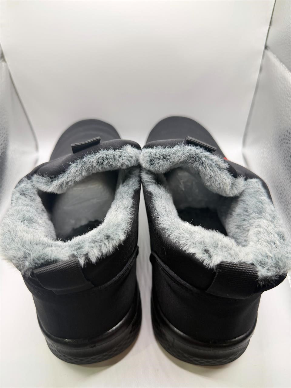 Fur-lined winter sport boots in size 8.5 from Republic Mercantile, featuring sturdy design and warm fur lining for cold weather.