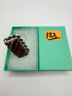 Ladies sterling silver ring with striped red Jasper gemstone in size 6.5, featuring a polished band and vibrant red stone.