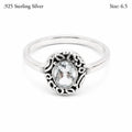 Ladies .925 Sterling Silver clear faceted oval crystal ring, size 6.5, with sparkling gemstone and sleek band design.