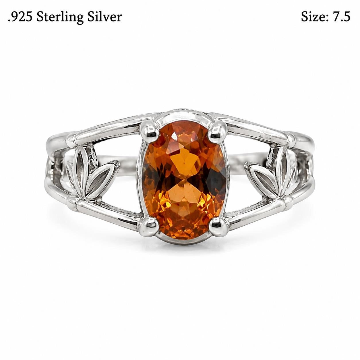 Sterling silver oval citrine ring with golden orange gemstone, size 7.5, by Republic Mercantile, featuring detailed band design.