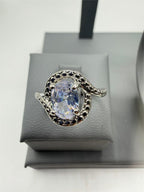 Sterling silver ladies mystic topaz ring size 6.75 featuring a vibrant, faceted gemstone and intricate band design.