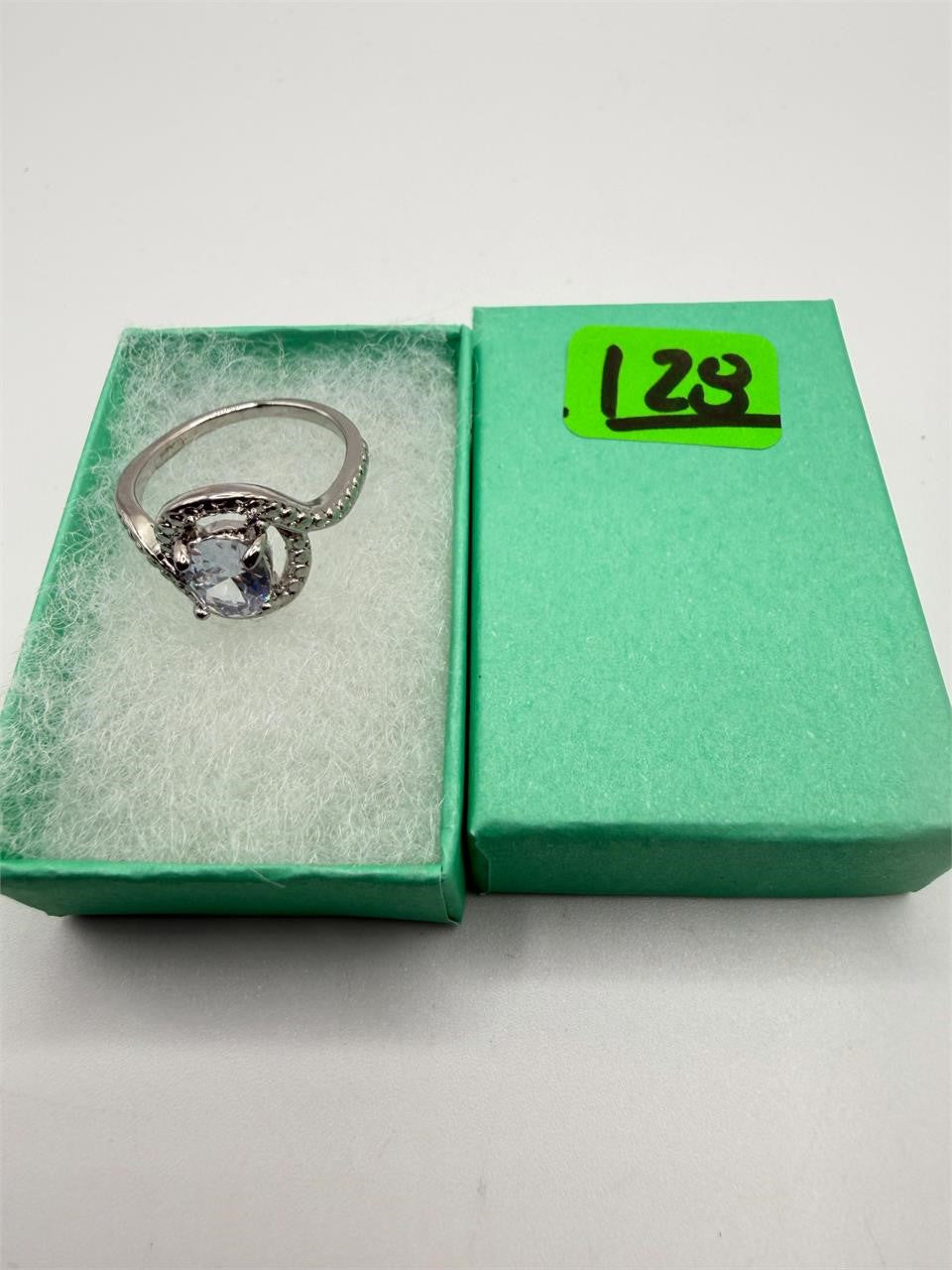 Ladies sterling silver mystic topaz ring in size 6.75 featuring a sparkling gemstone and intricate band design.