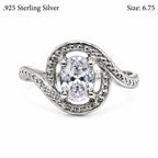 Lady's .925 sterling silver ring with a mystic topaz gemstone in size 6.75, showcasing intricate silver design.