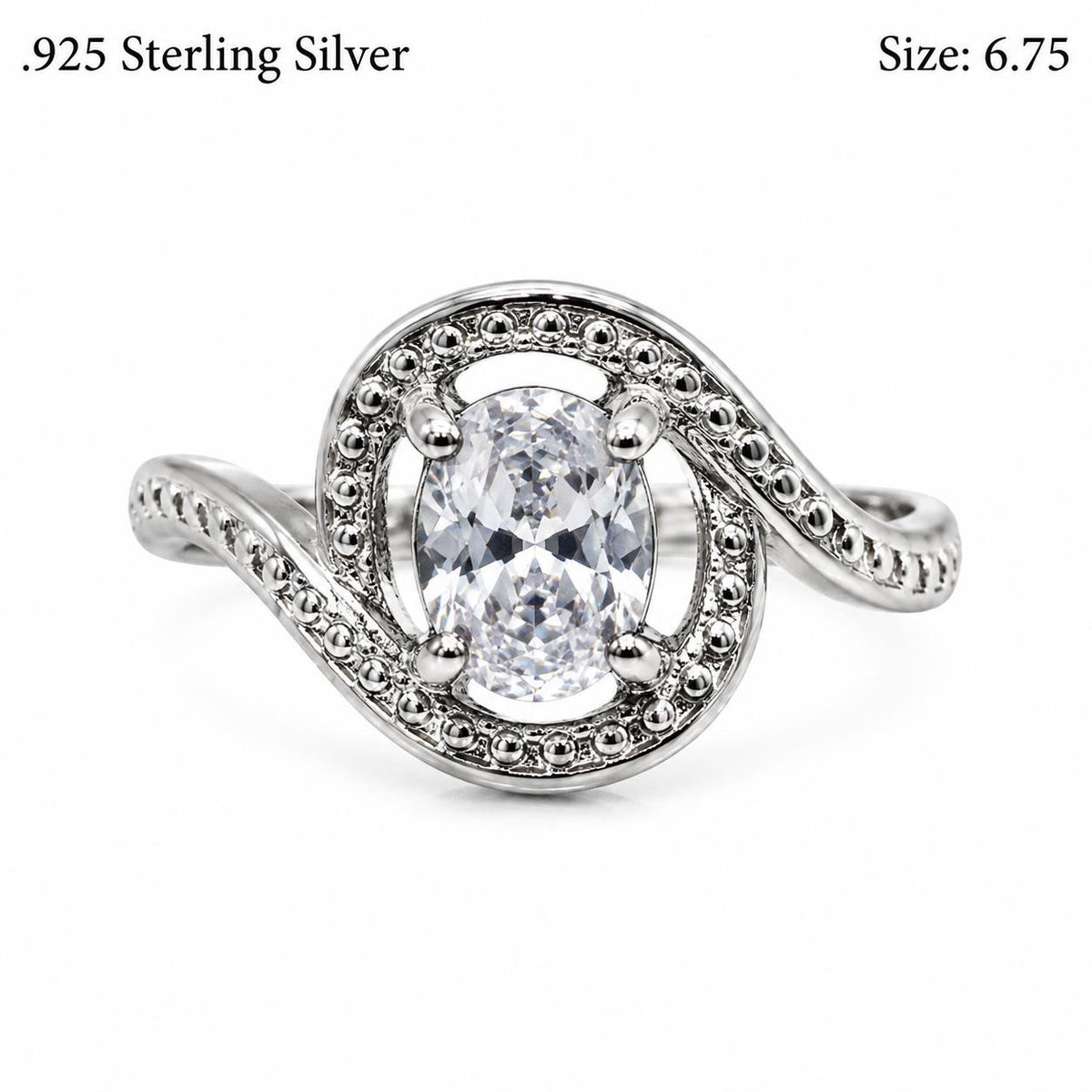 Lady's .925 sterling silver ring with a mystic topaz gemstone in size 6.75, showcasing intricate silver design.