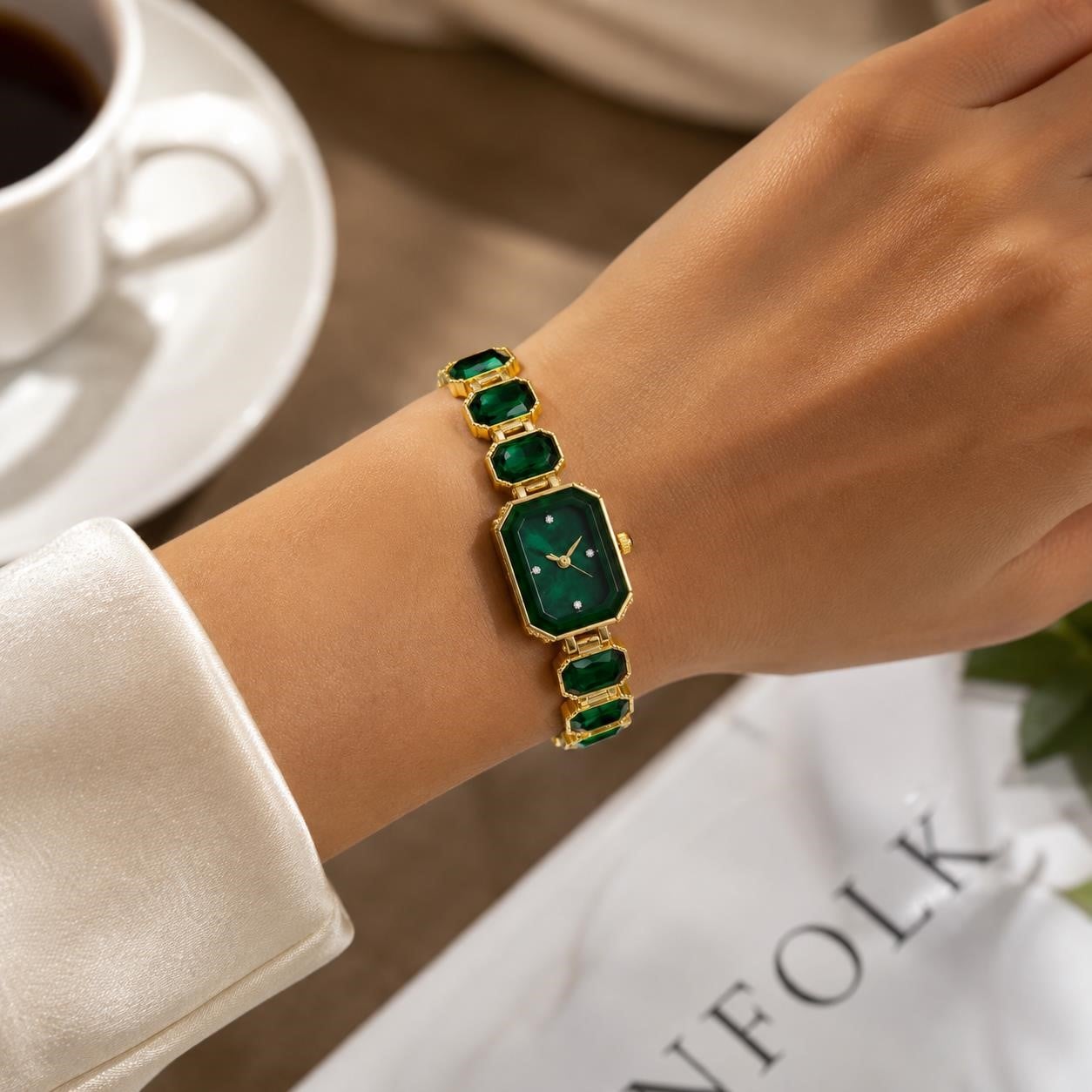 Ladies emerald green crystal stone band watch with silver-tone case and elegant design, perfect for stylish accessories.