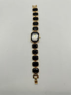 Ladies Onyx black crystal stone band watch with a sleek round face and silver accents, stylish and elegant for women.