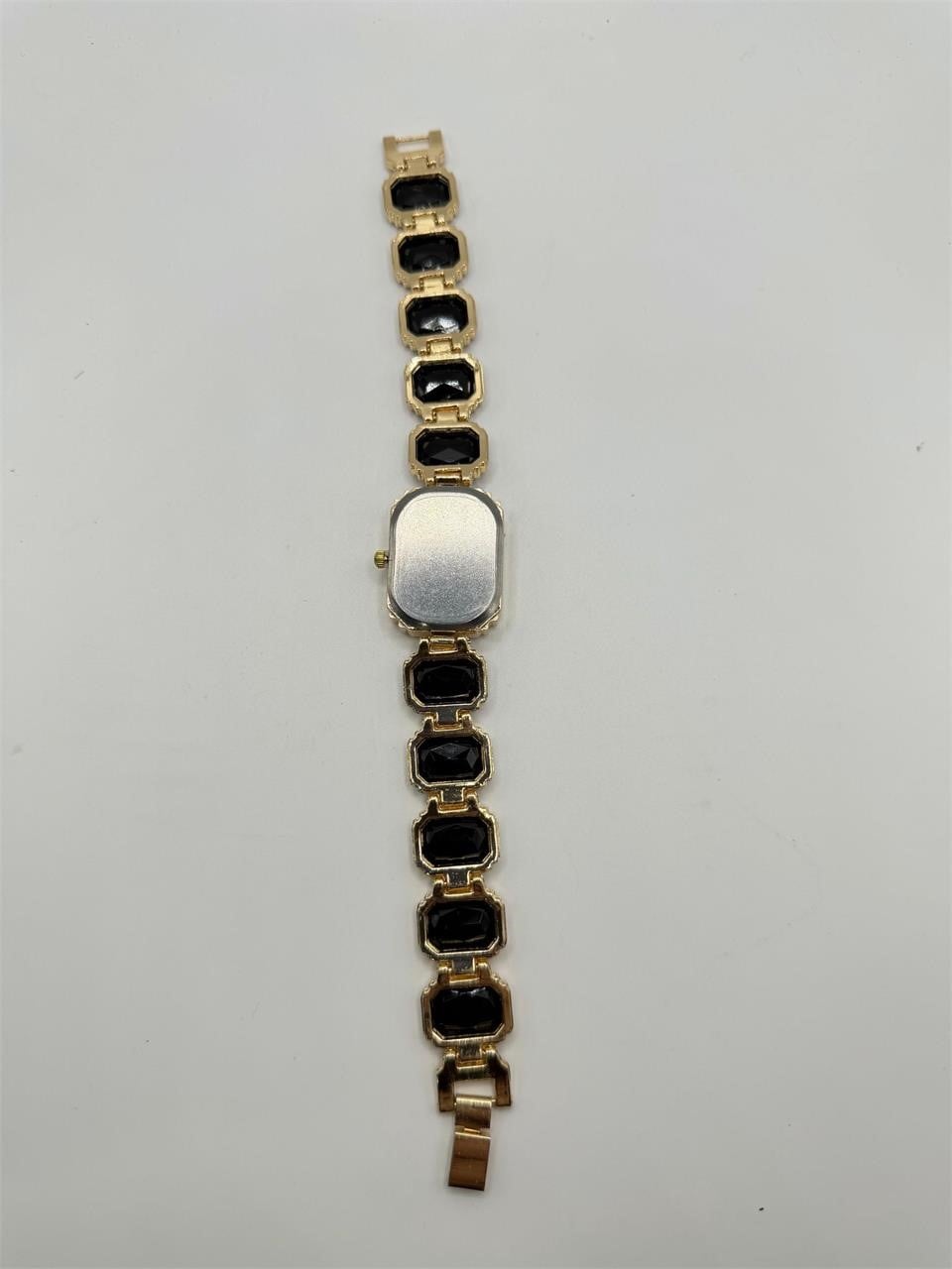 Ladies Onyx Black Crystal Stone Band Watch by Republic Mercantile, featuring a sleek black watch with crystal accents and a stylish band.