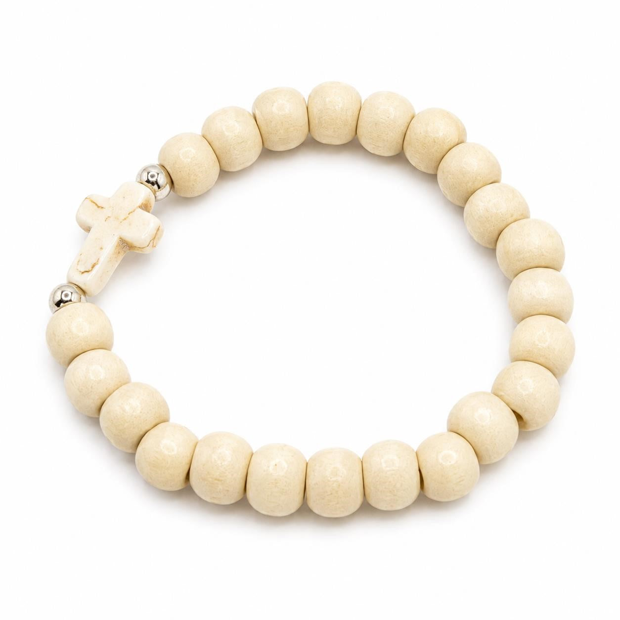 White beaded bracelet with a cross charm, stylish jewelry piece by Republic Mercantile, shown on a neutral background.