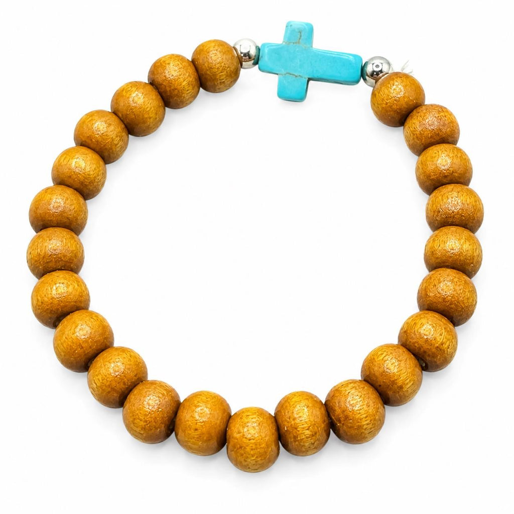 Beaded beige bracelet with blue cross charm, Republic Mercantile jewelry accessory featuring intricate beadwork and cross detail.