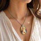 Enameled Virgin Mary pendant necklace in gold-tone with detailed religious design, offered by Republic Mercantile.
