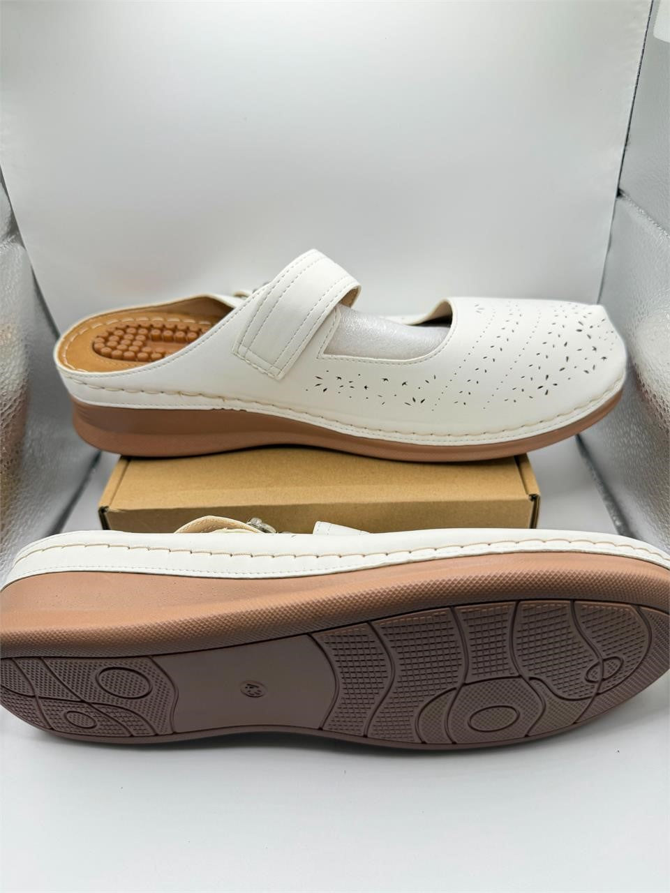 Women's white Ecetana wedge mules in size 10-10.5, featuring a stylish design with chunky heel and slip-on style.