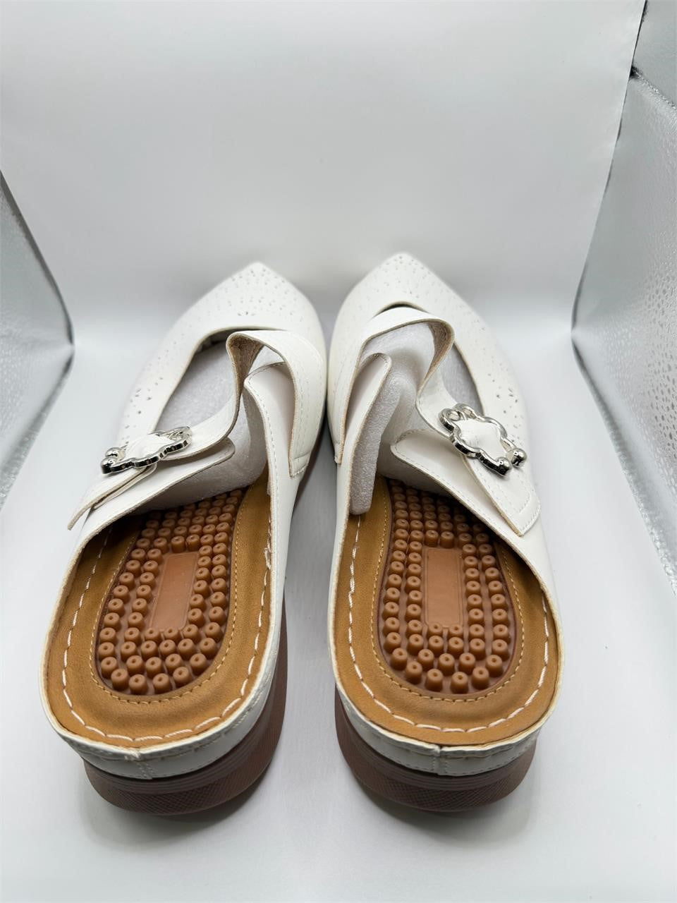 Women's white Ecetana wedge mules in size 10-10.5 with a stylish design and comfortable slip-on style.