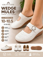 Women's white Ecetana wedge mules in size 10-10.5, featuring a stylish slip-on design and comfortable wedge heel.