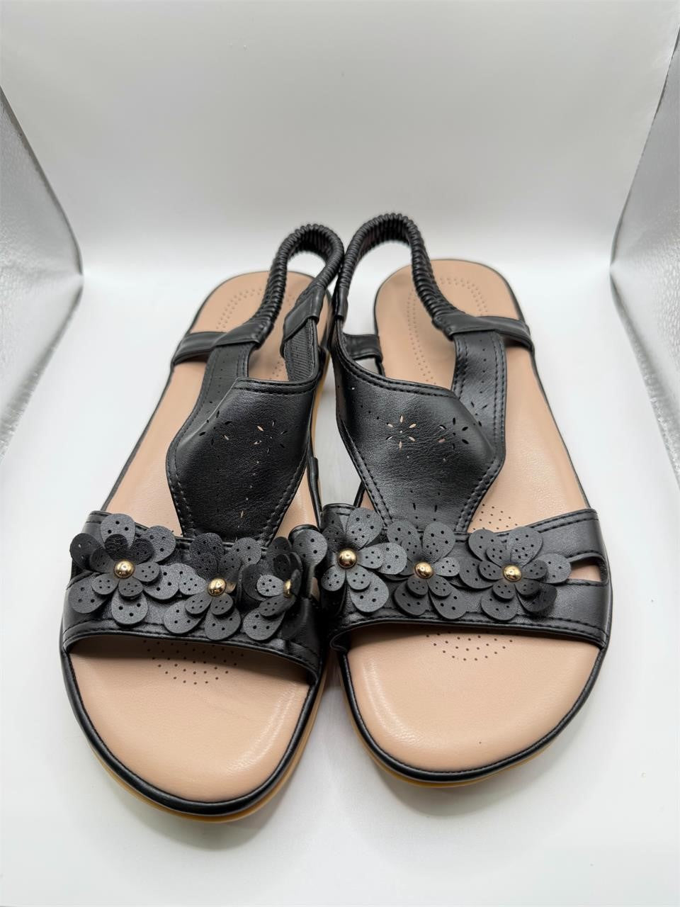 Ecetana black flat sandals with boho design in size 7.5, featuring comfortable strap details and casual style.
