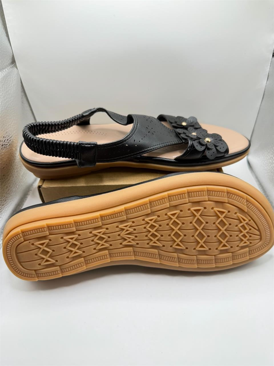 Ecetana black flat boho sandals in size 7.5, featuring a stylish strappy design and comfortable sole.