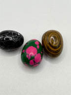 Polished oval gemstone cabochon collector set with three vibrant stones from Republic Mercantile, showcasing smooth, colorful gemstone surfaces.