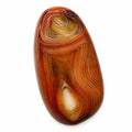 Polished banded agate loose gemstone cabochon from Republic Mercantile showing colorful natural banding and smooth polished surface.