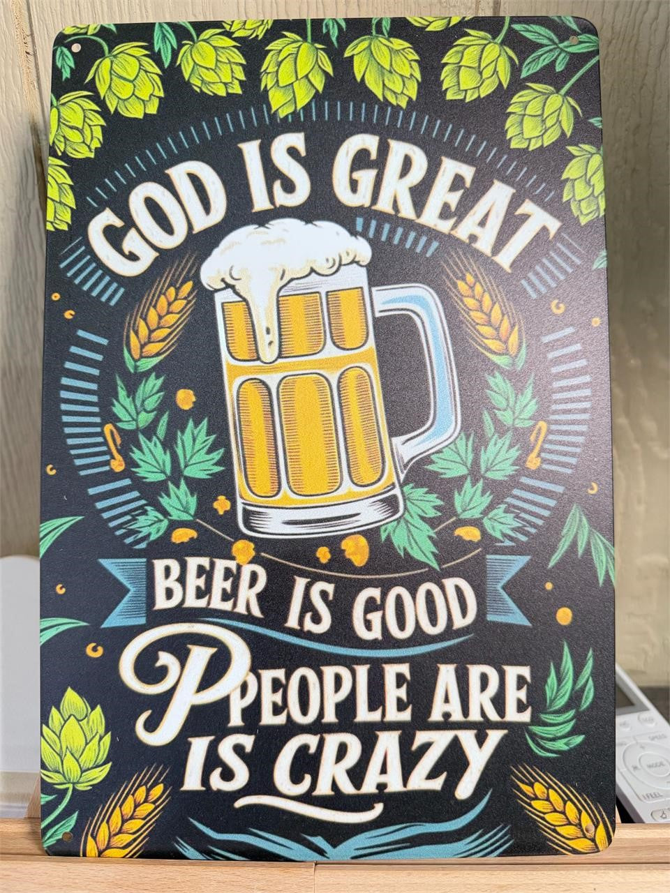 8x12 inch metal wall art tin by Republic Mercantile featuring the phrase "God is Great" in decorative design.