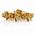 Ornate floral hair barrette with intricate metalwork and detailed flower design, perfect for elegant hair styling.