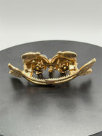 Black ornate butterfly hair barrette with intricate details, jewelry-inspired design, perfect for elegant hairstyles.