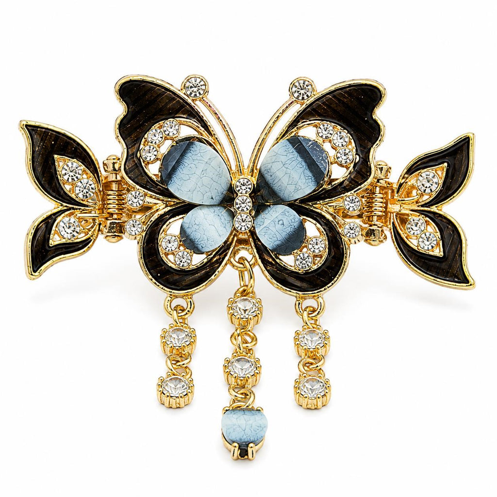 Ornate black butterfly hair barrette from Republic Mercantile with intricate detailing and glossy finish, suitable for elegant hairstyles.
