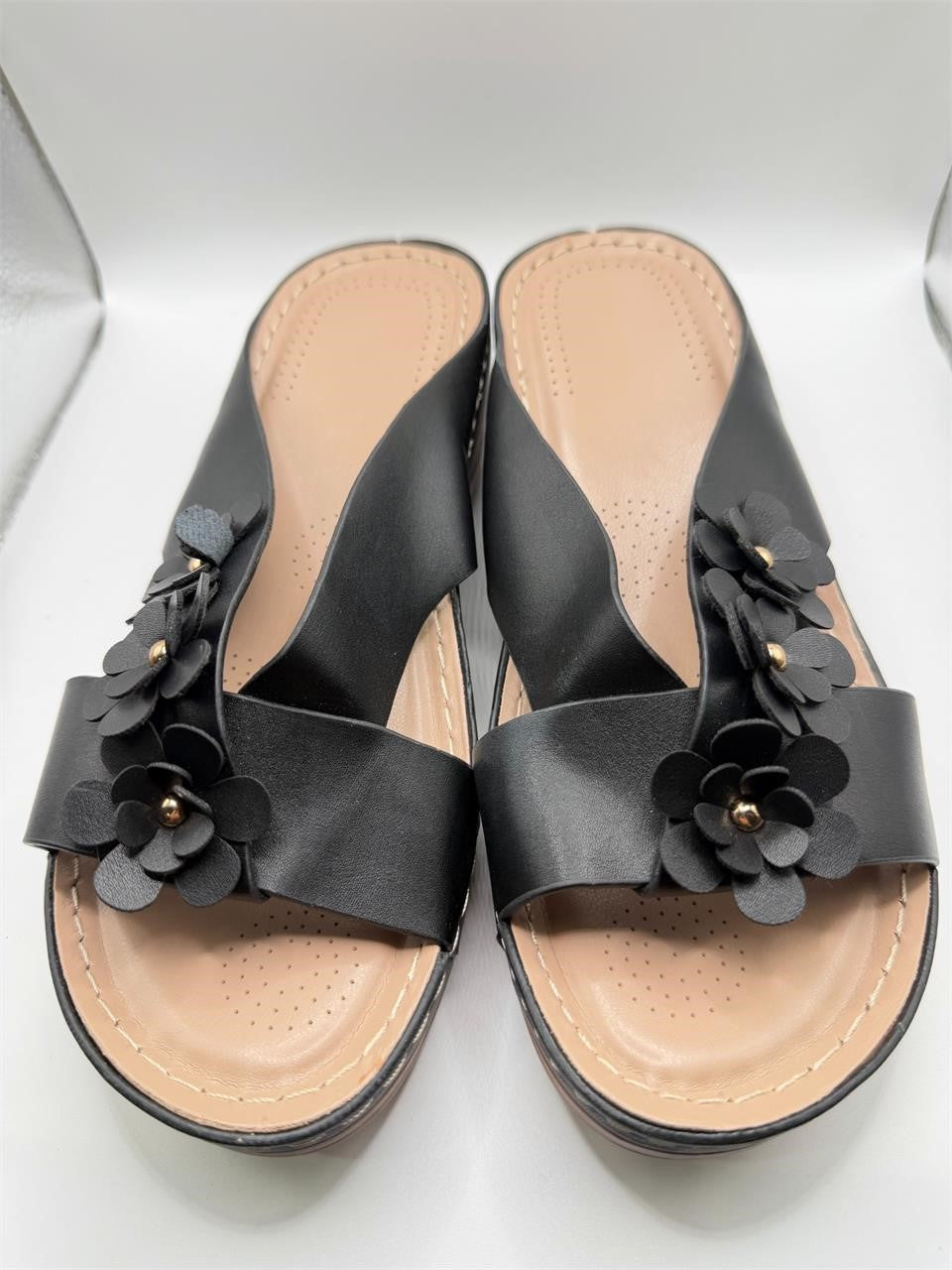 Ladies black slip-on wedge sandals by Republic Mercantile, size 6, featuring comfortable design and stylish wedge heel.