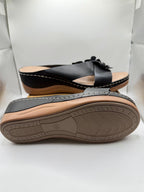 Ladies black slip-on wedge sandals by Republic Mercantile, size 6, featuring comfortable design and stylish casual footwear.