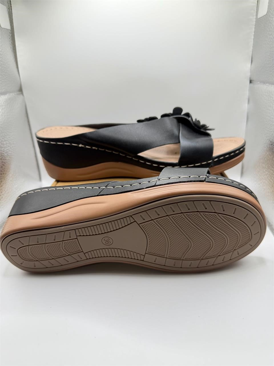 Ladies black slip-on wedge sandals by Republic Mercantile, size 6, featuring comfortable design and stylish casual footwear.