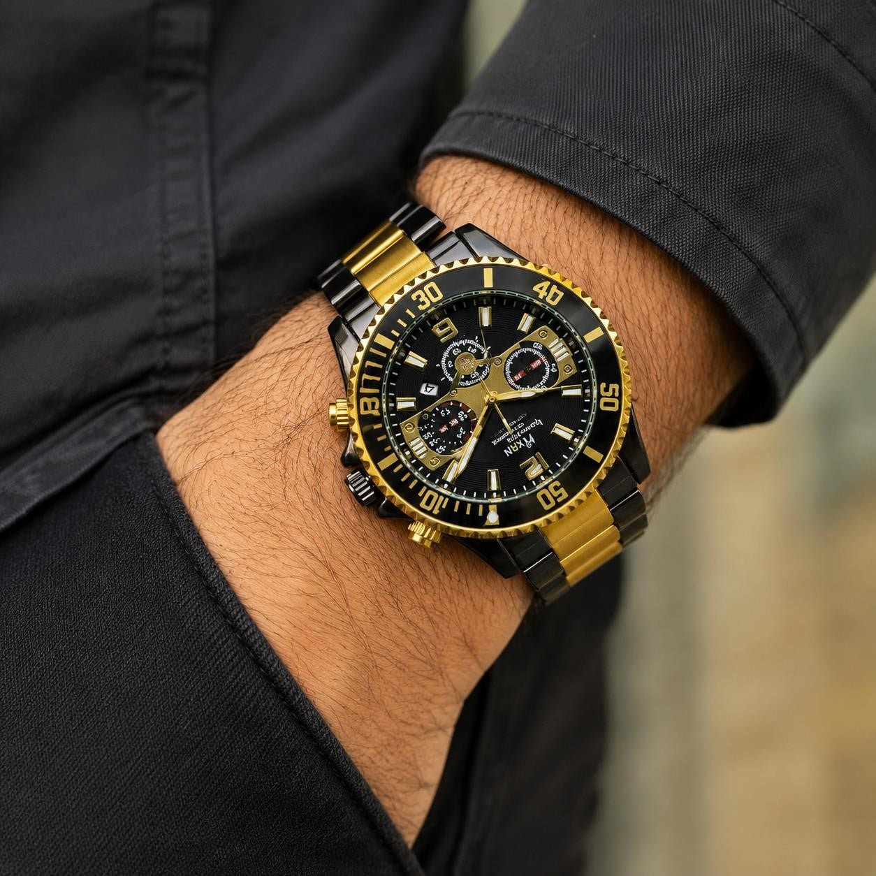 Men's Hkun black and gold case and band watch by Republic Mercantile, showing the stylish timepiece with metallic details.