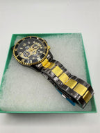 Men's Republic Mercantile Hkun black and gold watch with a round case and matching band, showcasing a sleek, stylish design.