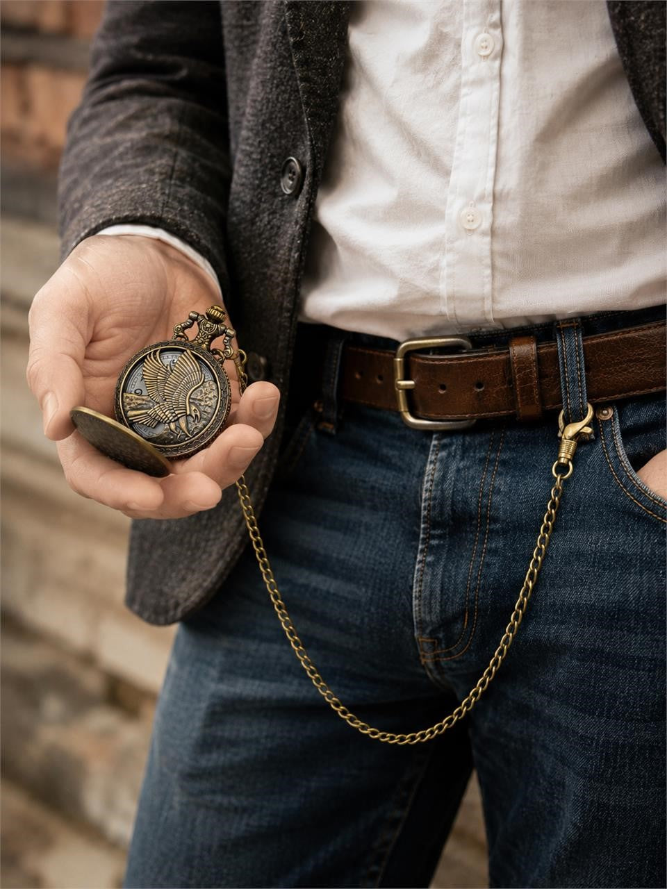Silver man's pocket watch with chain featuring an eagle design by Republic Mercantile, vintage style with intricate details.