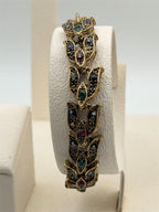 Vintage gold tone leaf rhinestone bracelet with intricate detailing from Republic Mercantile.