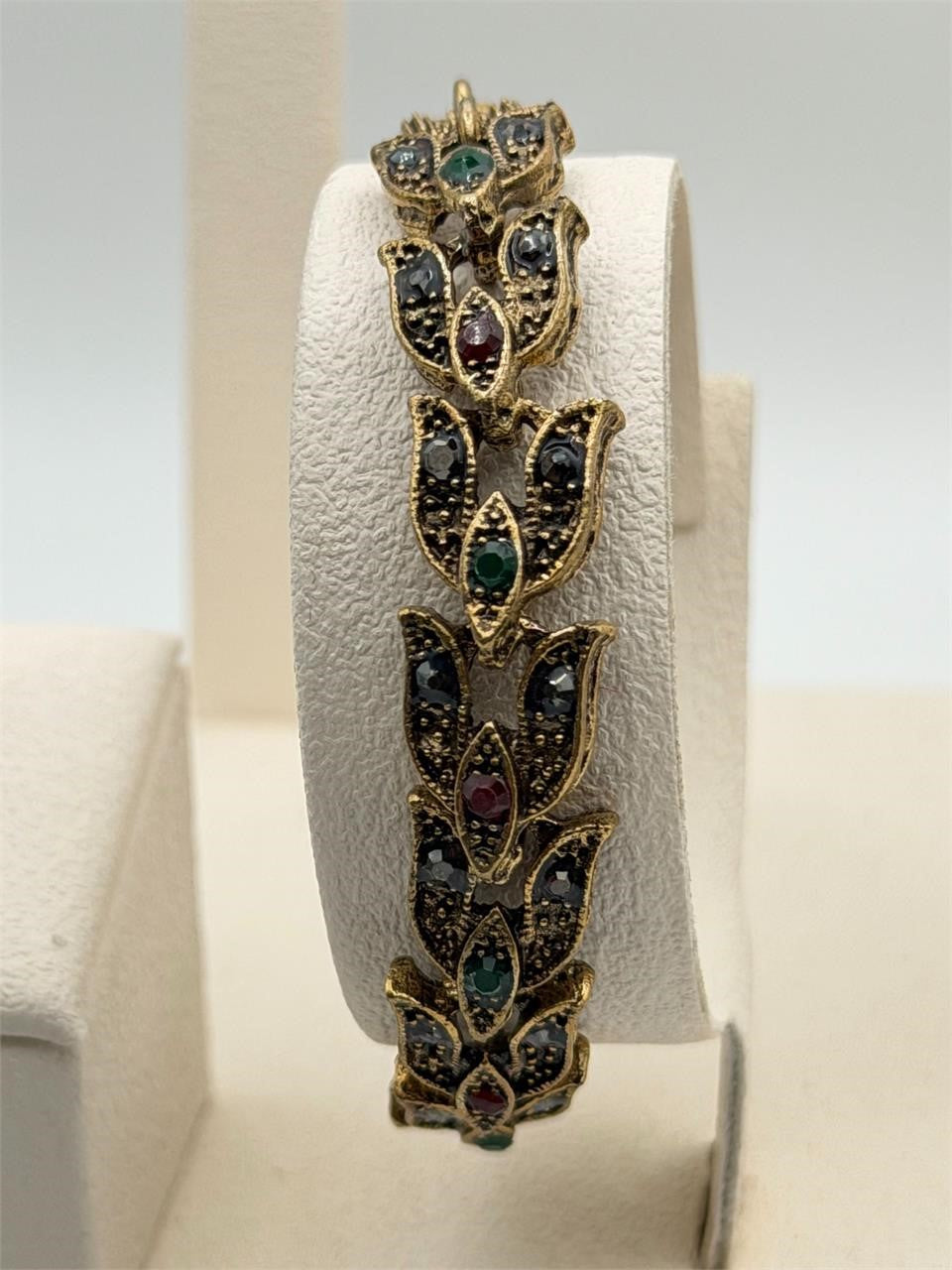 Vintage gold tone leaf rhinestone bracelet with intricate detailing from Republic Mercantile.