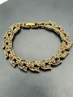 Vintage style gold tone leaf rhinestone bracelet with intricate leaf design and sparkling rhinestones, from Republic Mercantile.