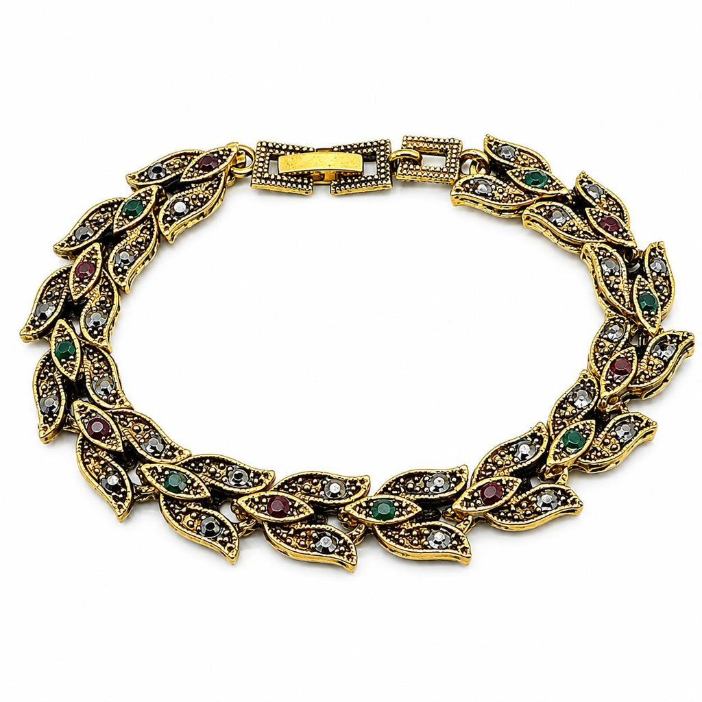 Vintage style gold tone leaf rhinestone bracelet by Republic Mercantile featuring intricate leaf design and sparkling rhinestones.
